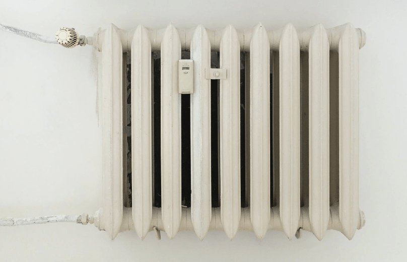 A white radiator on a wall